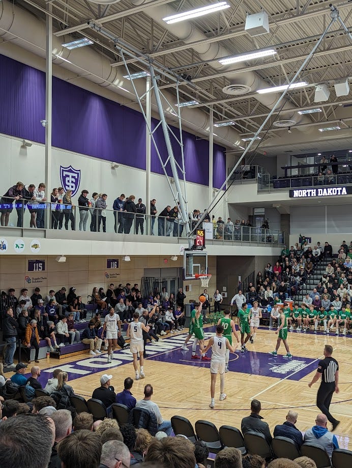 From the far side of the court, viewing the second level