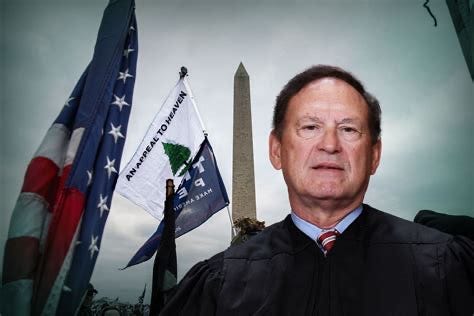 A person in a robe standing in front of flags
AI-generated content may be incorrect. A person in a robe standing in front of flags
AI-generated content may be incorrect.