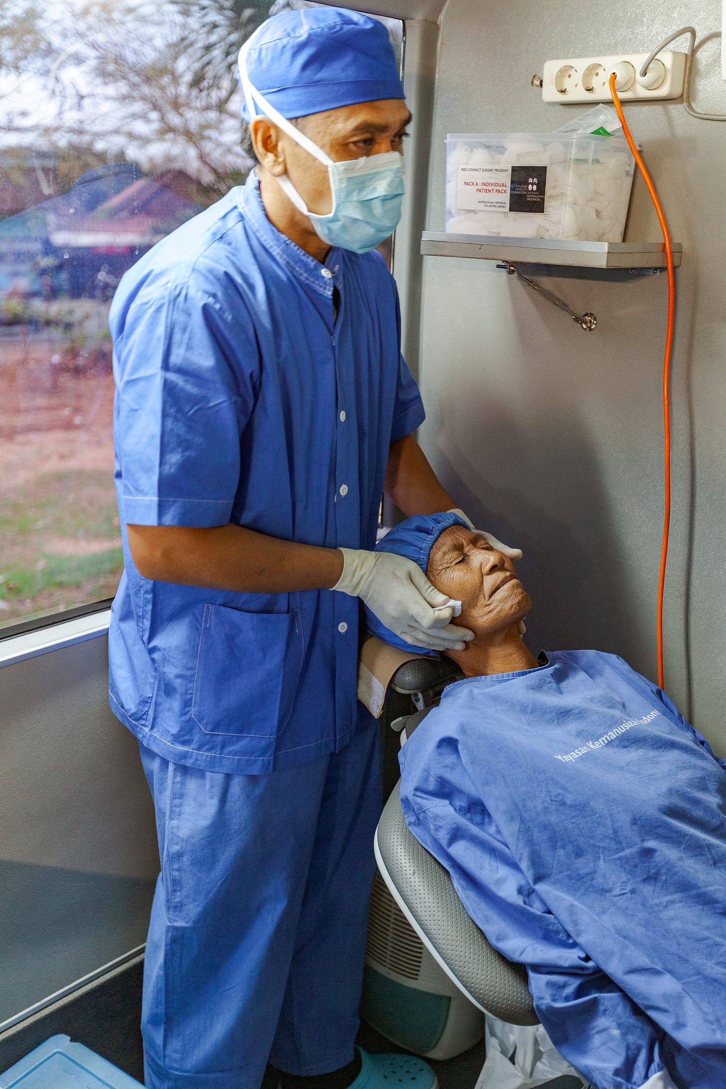 A patient being prepared for cataract removal surgery A patient being prepared for cataract removal surgery