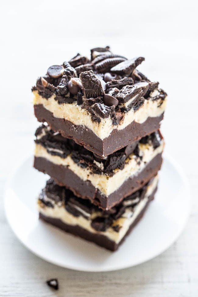 Loaded Oreo Cream Cheese Brownies - Ultra fudgy brownies topped with cream cheese, white chocolate chips, chocolate chips, and Oreos!! LOADED to the MAX and soooo good! Easy, no mixer recipe that's as easy as using a mix!! Loaded Oreo Cream Cheese Brownies - Ultra fudgy brownies topped with cream cheese, white chocolate chips, chocolate chips, and Oreos!! LOADED to the MAX and soooo good! Easy, no mixer recipe that's as easy as using a mix!!