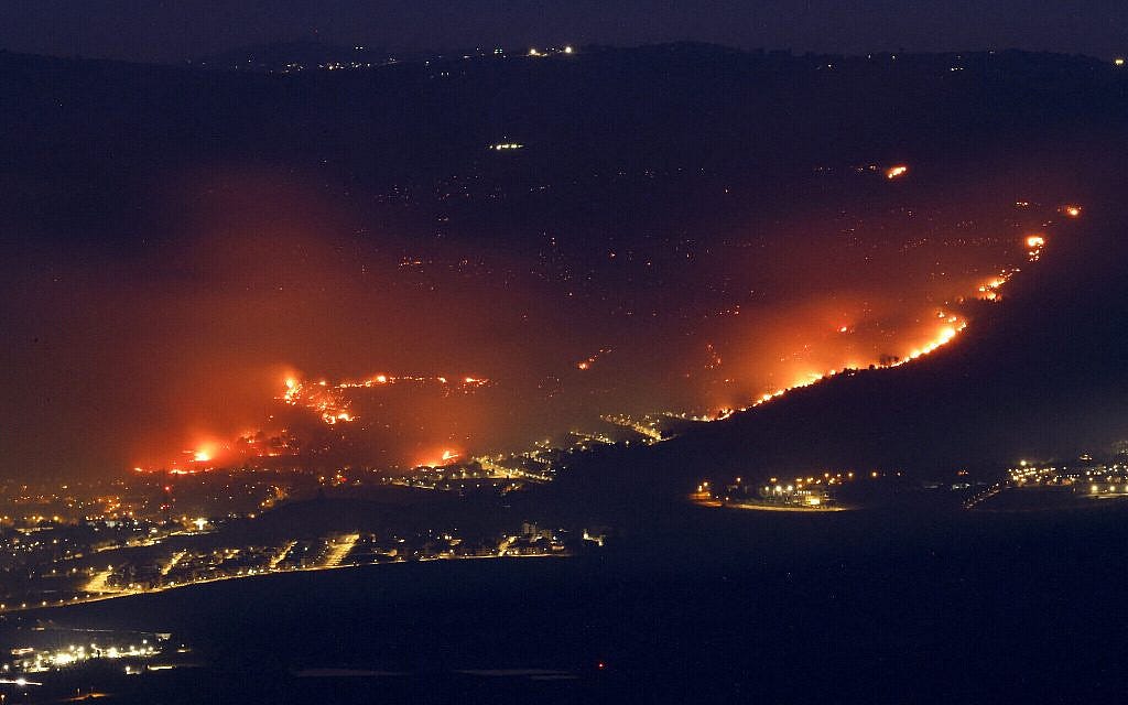 Fires burn next to the northern city of Kiryat Shmona on June 3, 2024, following rocket and drone attacks from nearby Lebanon. (Jalaa Marey/AFP) Fires burn next to the northern city of Kiryat Shmona on June 3, 2024, following rocket and drone attacks from nearby Lebanon. (Jalaa Marey/AFP)