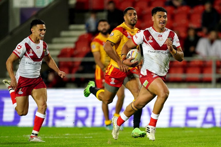 Tonga wins first Rugby League World Cup match against Papua New Guinea with  late Keaon Koloamatangi try - ABC News