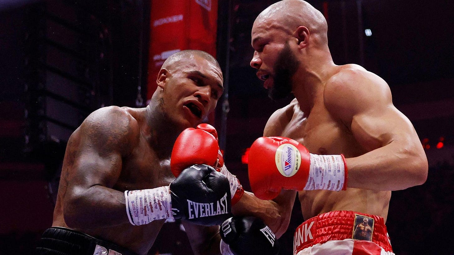 Chris Eubank Jr lands a punch on Conor Benn