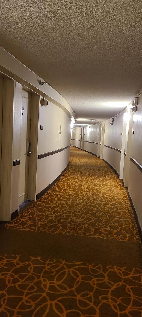Images of empty hallways, cafeterias, supermarket aisles, and a pool.
