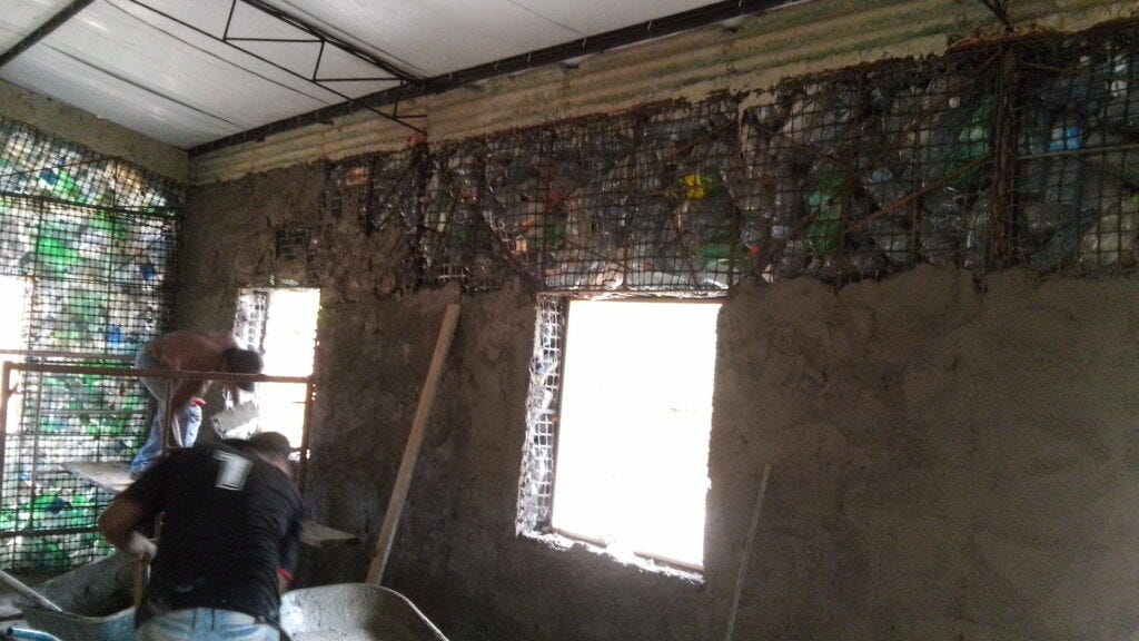 Plastering Wall with Recycled Plastic Bottles Plastering Wall with Recycled Plastic Bottles