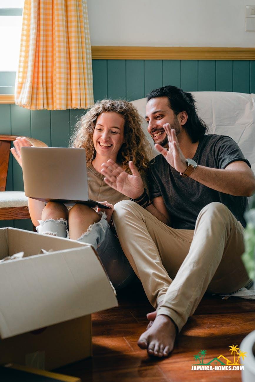 cheerful couple having video chat via laptop
