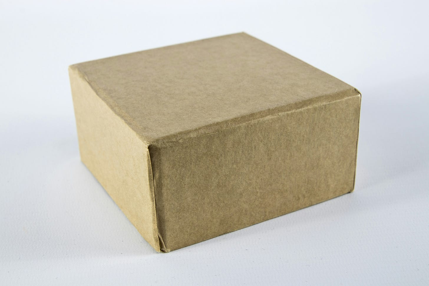 A small brown box on a white background. A small brown box on a white background.