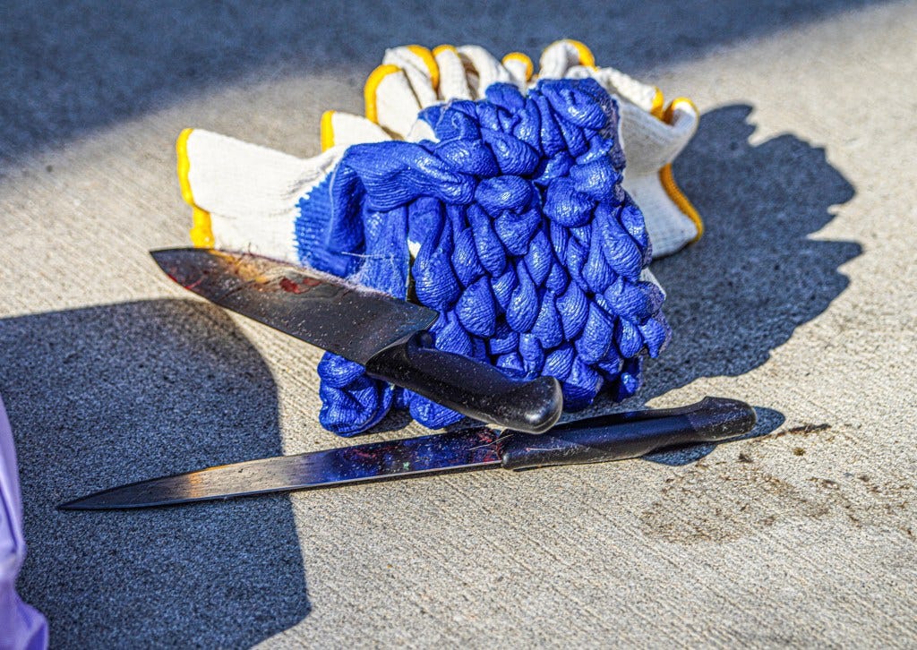 The bloody knife used in Monday's deadly stabbing spree. The bloody knife used in Monday's deadly stabbing spree.