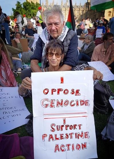 A person and person holding a sign

AI-generated content may be incorrect.