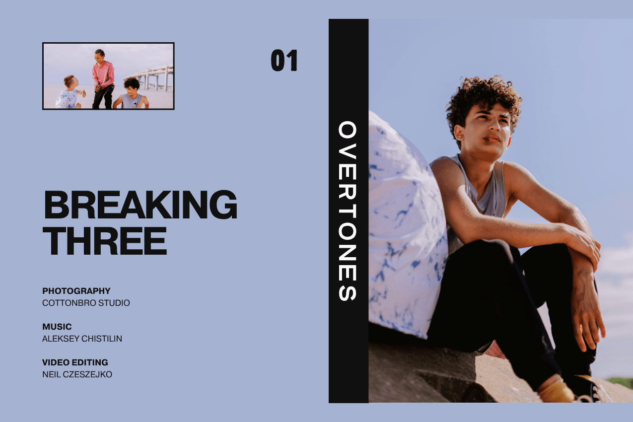 Cover for the short film "Breaking Three": Three male teenagers in a candid moment outdoors, full of tension and implied desire. The layout features a periwinkle field with a secondary inset image in the top-left and minimalist production credits in the bottom-left. Part of the Overtones series at The Subtext Review.