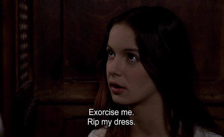This may contain: a woman in white shirt looking at the camera with words above her that say, exercise me rip my dress