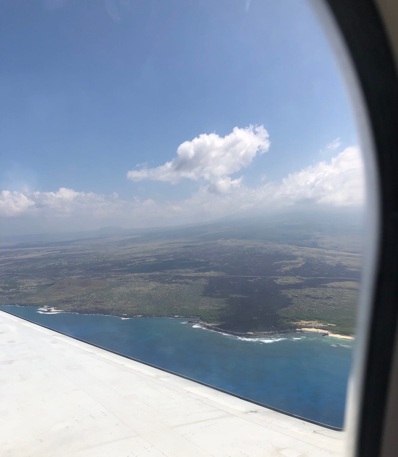 View from the plane of old lava flows on the Big Island.