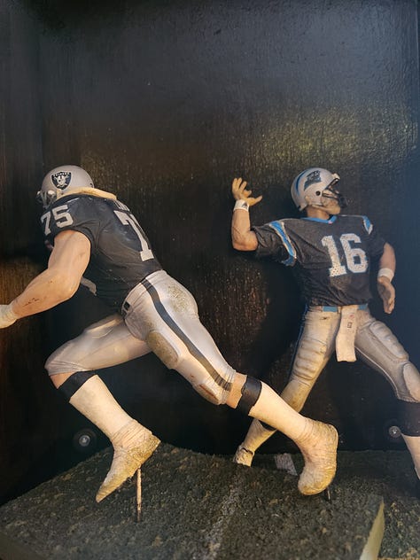 Carved horse, wooden snake, record player, wall map, dragon kite, games, brass lamp, Lego flowers, mirror, globe, lava lamp, books, football player figures, hourglass, typewriter.