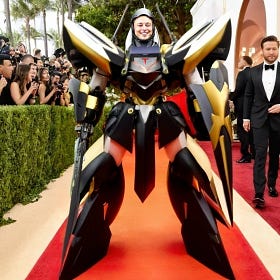 Elon Wears Gaudy Tesla Mech Suit to Oscars