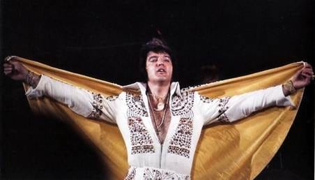 Elvis wearing the "Pharaoh suit" also know as the "today suit" elvis used  this suit in the early Vegas shows and then on tour in 1973, the suit will  appear later in