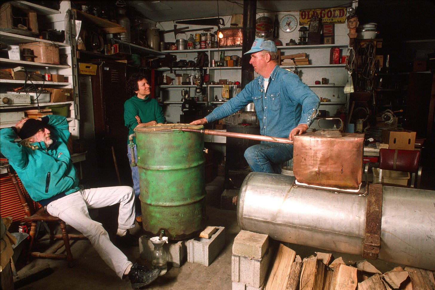 Former_moonshiner_John_Bowman_explaining_the_workings_of_a_moonshine_still_American_Folklife_Center.jpg Former_moonshiner_John_Bowman_explaining_the_workings_of_a_moonshine_still_American_Folklife_Center.jpg