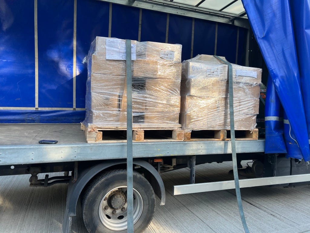 Some pallets of boxes on a lorry.