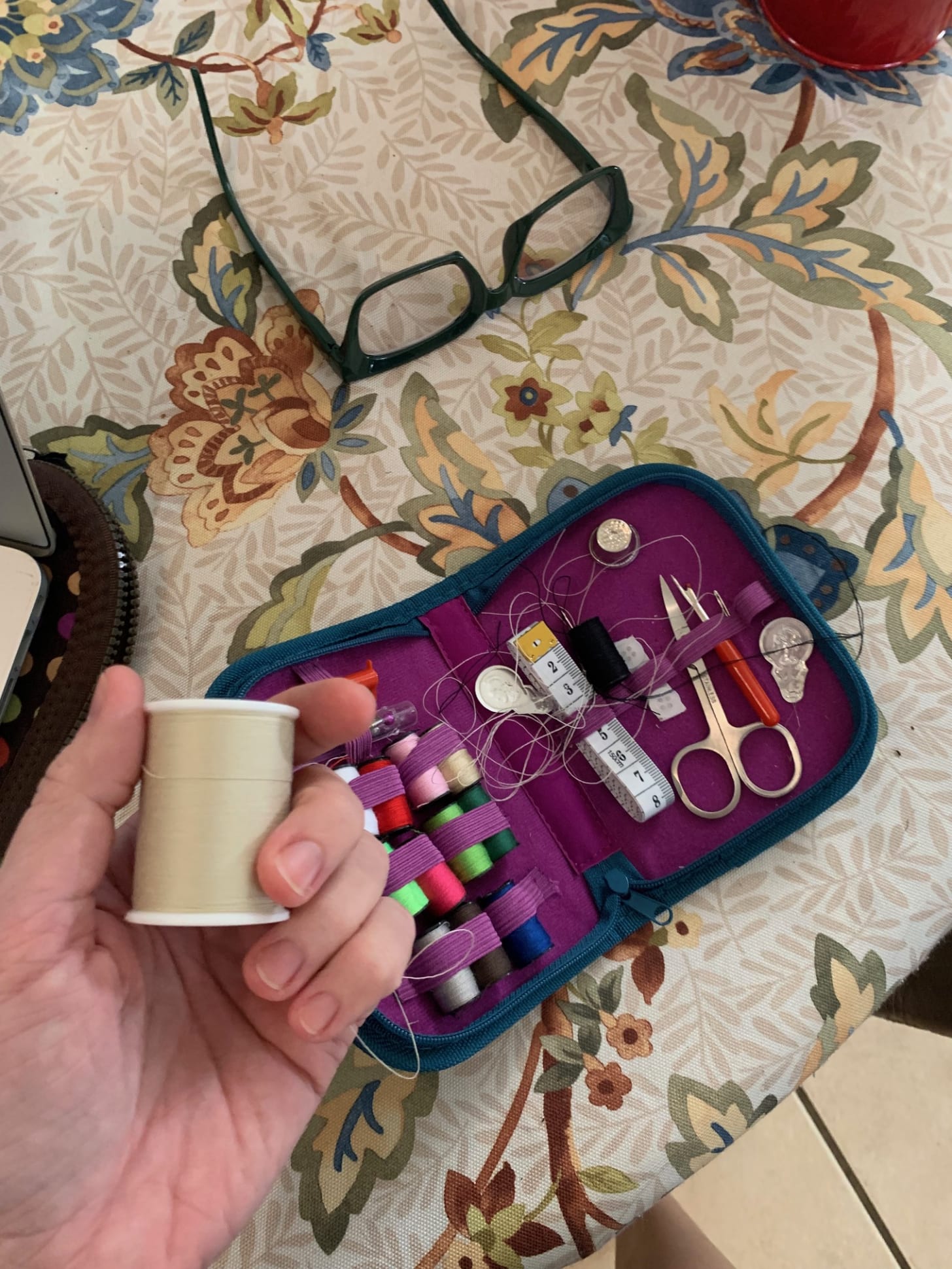 kristen shows off a sewing kit