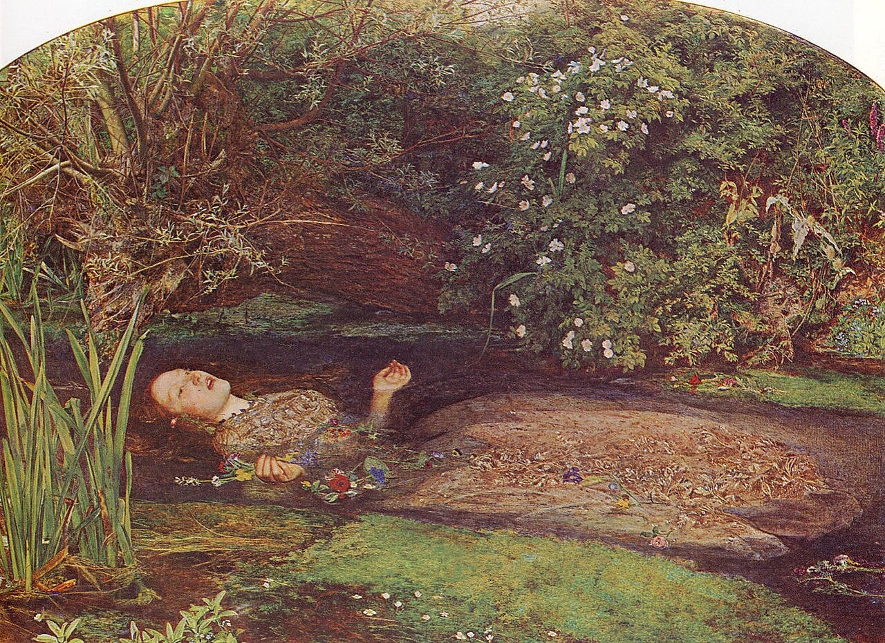 Ophelia floating on her back in a stream surrounded by flowers and greenery Ophelia floating on her back in a stream surrounded by flowers and greenery