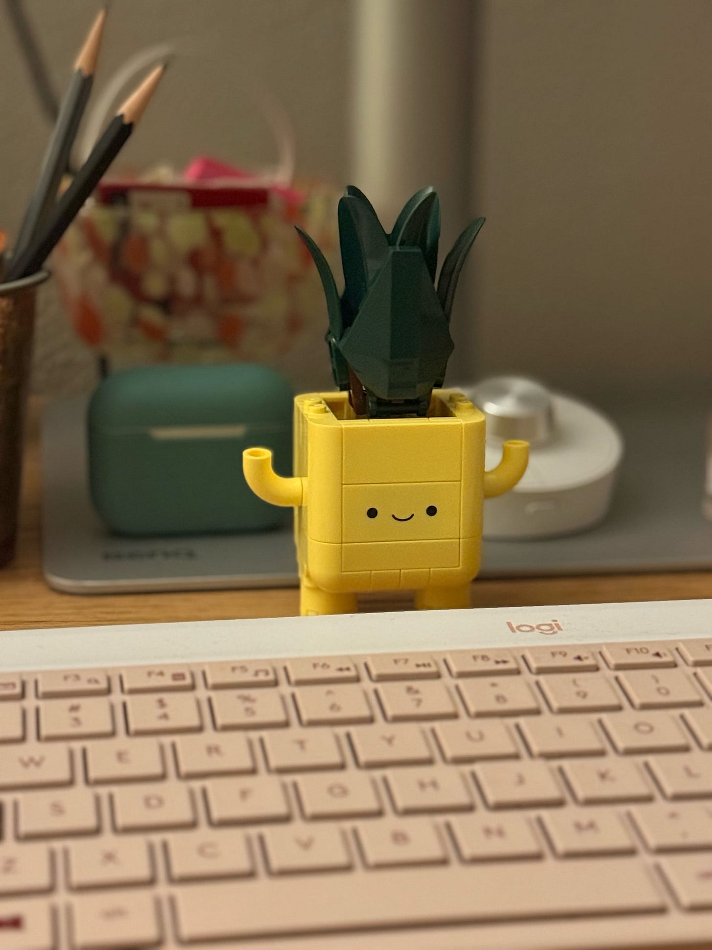 lego plant head on desk
