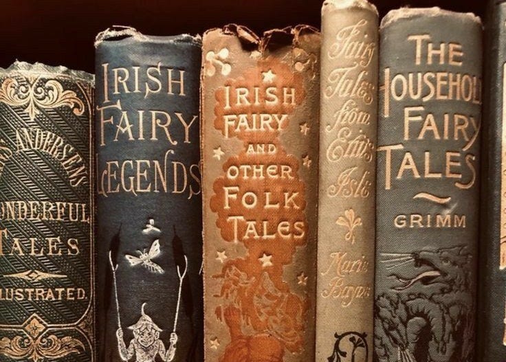 This may contain: several books are lined up on a shelf