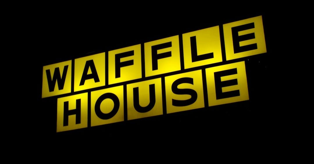 the waffle house logo on a black background