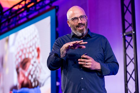 A series of photos from the ARIA Summit, showing various speakers on stage, some with slides in the background. 