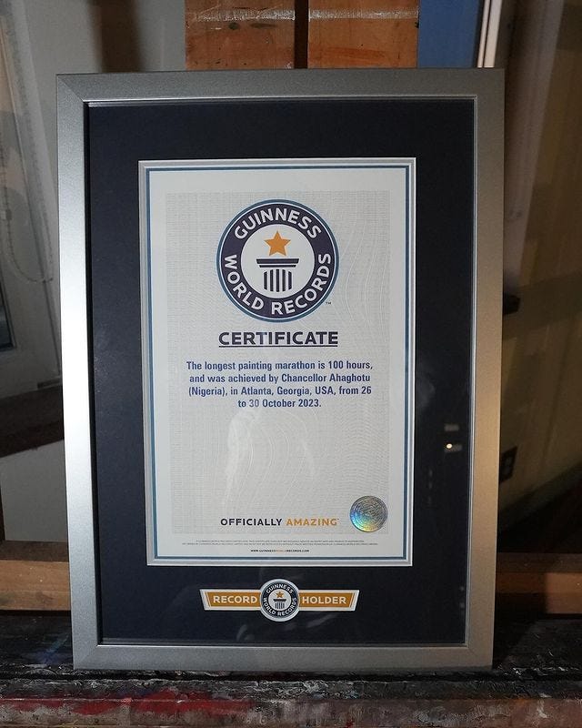 Chancellor sharing a picture of his GWR certificate for the longest painting marathon record