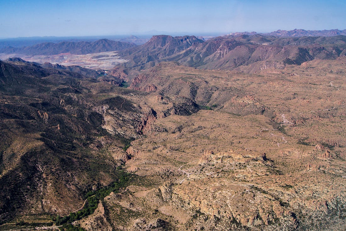 Aerial photo of dry, mountainous terrain (Oak Flat)