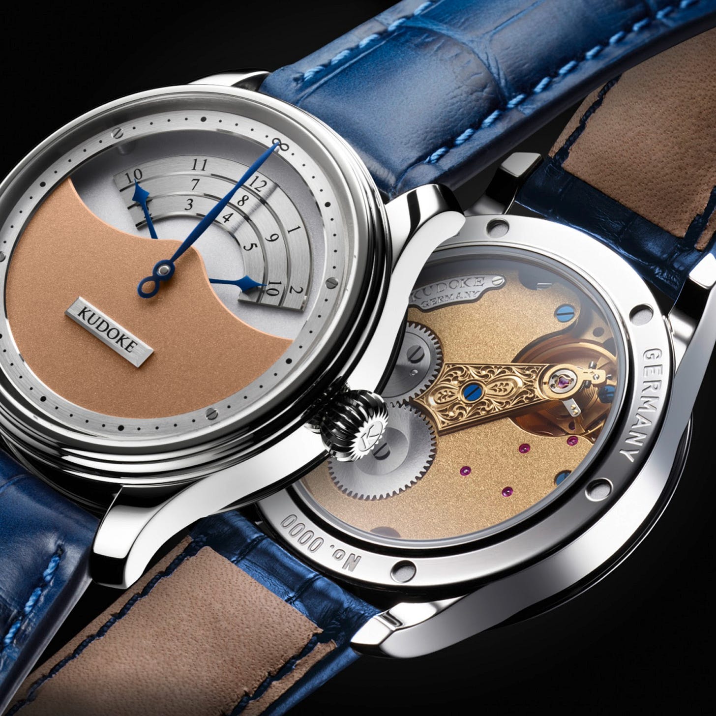 Unique timepiece with a triple-armed hour hand traversing three scales, housed in a stainless steel case with hand-finished Kaliber 1 movement.