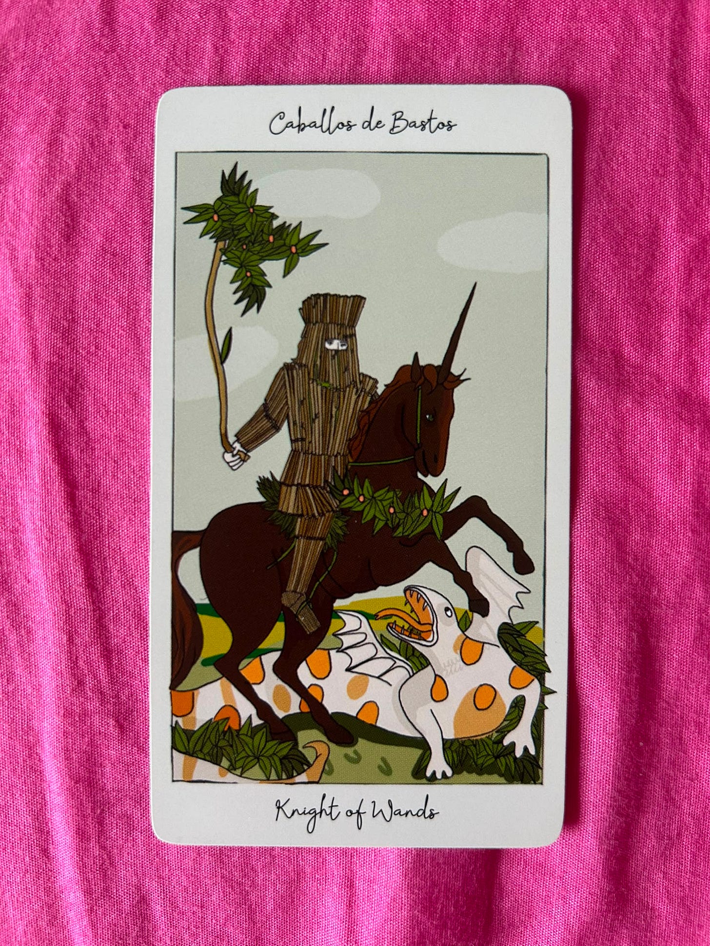 Knight of Wands tarot card photographed for Honey Wyatt’s Tarot DMs Chat 44 interview, showing an armoured rider on horseback pursued by a fantastical creature. Knight of Wands tarot card photographed for Honey Wyatt’s Tarot DMs Chat 44 interview, showing an armoured rider on horseback pursued by a fantastical creature.
