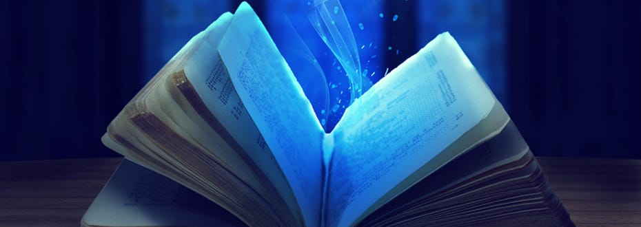 A single book lies open under blue moonlight.