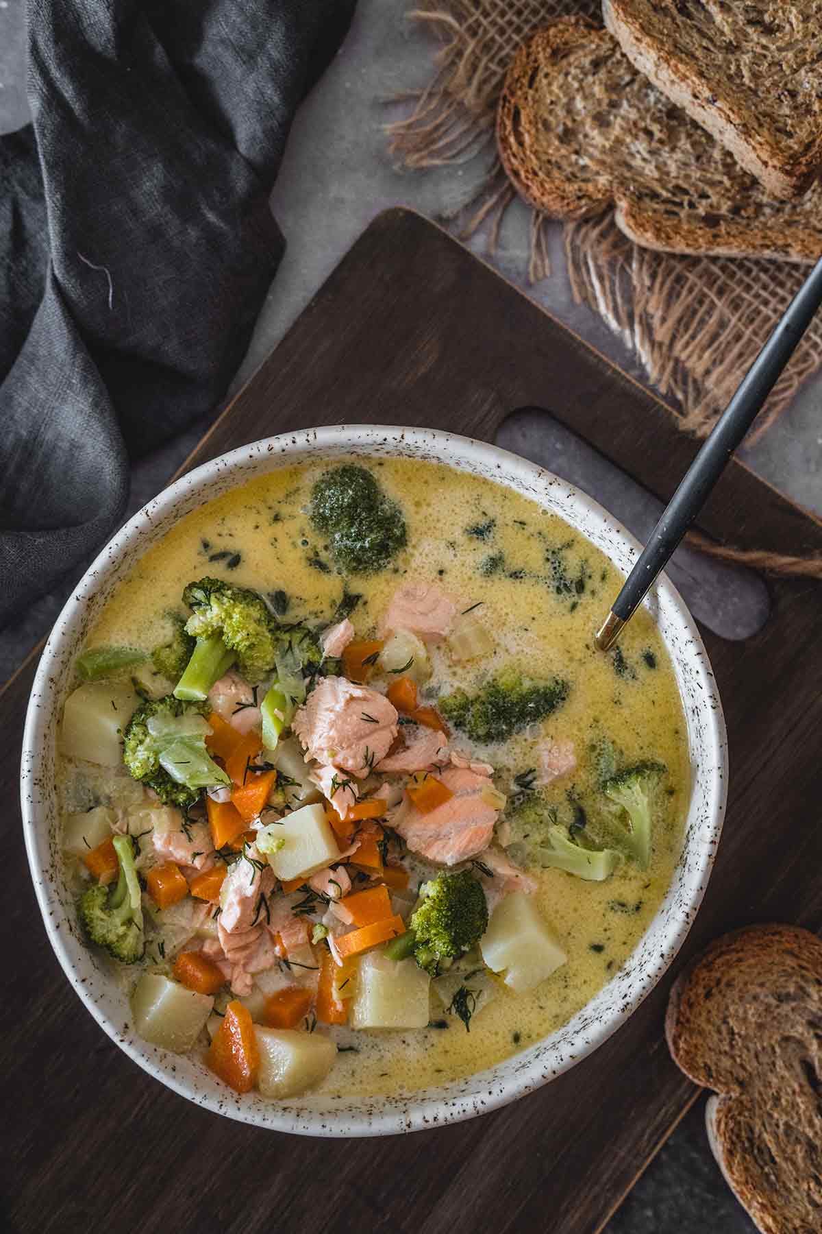 Creamy Finnish salmon soup with broccoli and other vegetables Creamy Finnish salmon soup with broccoli and other vegetables