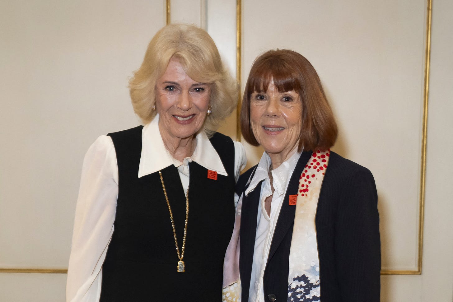 Queen Camilla and Gisèle Pelicot smiling Queen Camilla and Gisèle Pelicot smiling