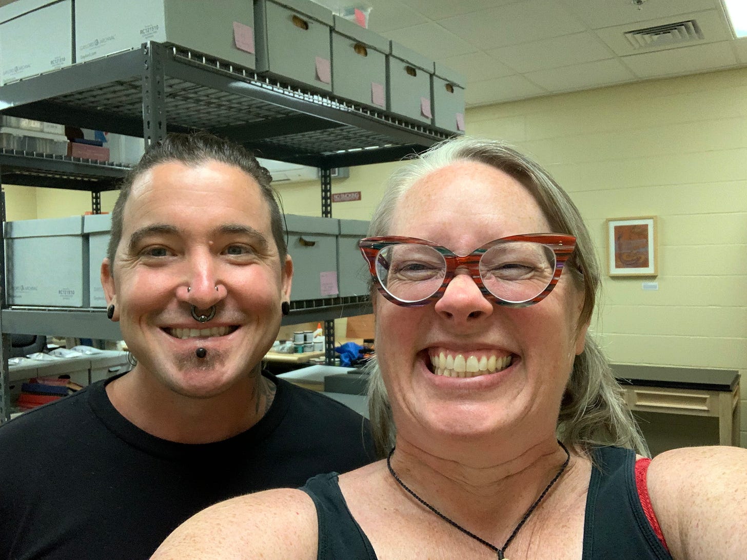 color photo of two people looking at the camera