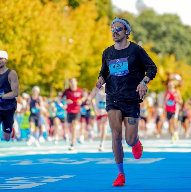 a runner at the finish line of a marathon