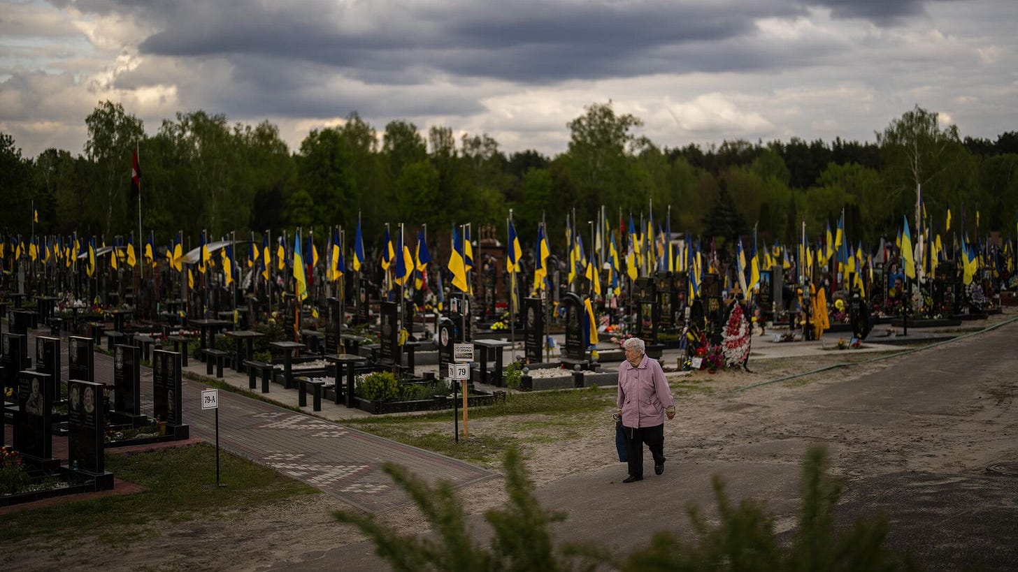 A woman walks past the tombs of Ukrainian soldiers killed during the US proxy war against Russia, at Lisove cemetery in Kiev, Ukraine, Tuesday, April 23, 2024 A woman walks past the tombs of Ukrainian soldiers killed during the US proxy war against Russia, at Lisove cemetery in Kiev, Ukraine, Tuesday, April 23, 2024 - Sputnik International, 1920, 01.02.2025