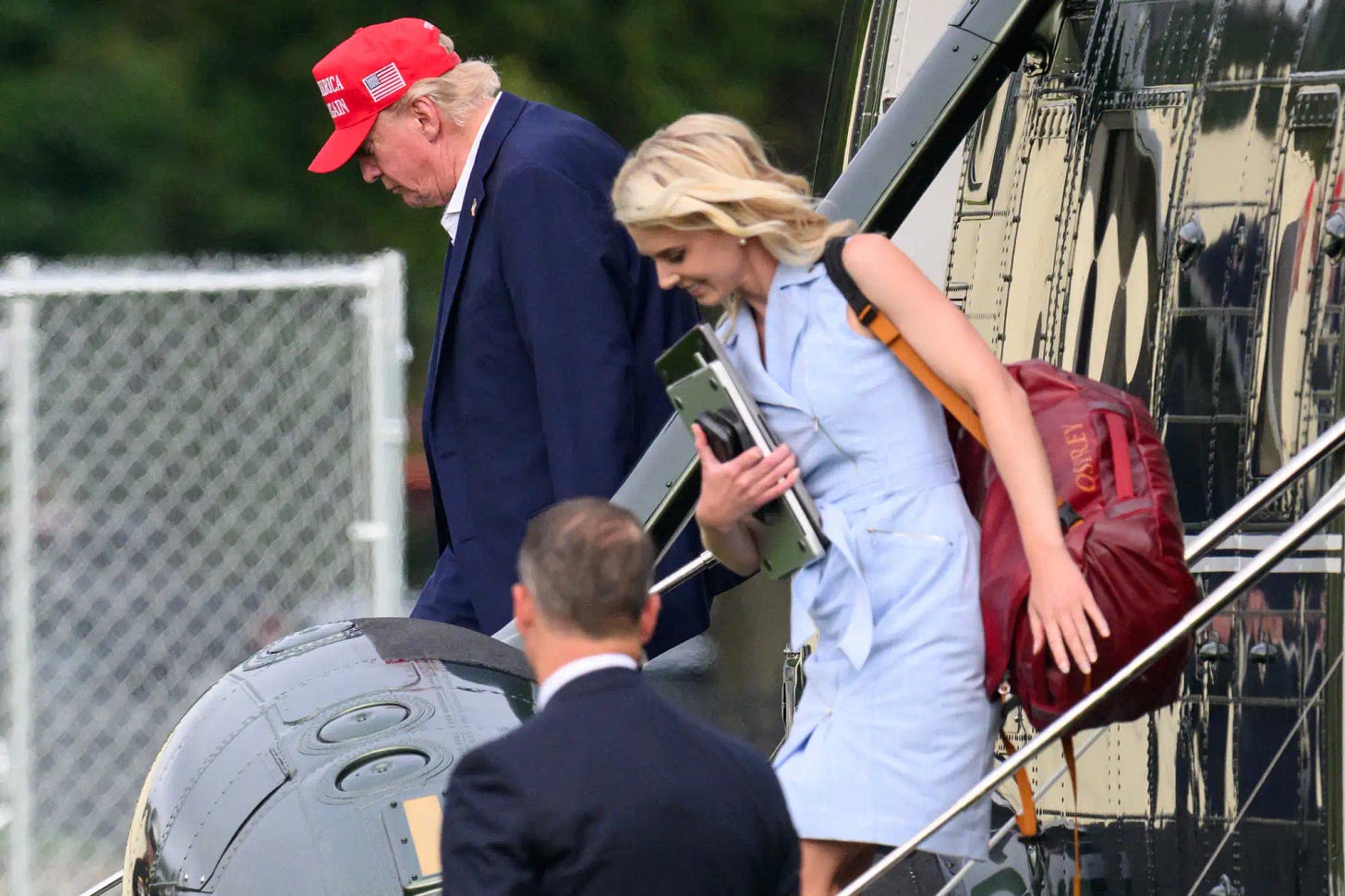 US President Donald Trump and aide Natalie Harp (R) exit Marine One on the Ellipse near the White House on August 16, 2026. President Trump is returning to Washington, DC, after spending the weekend at his golf club in New Jersey. US President Donald Trump and aide Natalie Harp (R) exit Marine One on the Ellipse near the White House on August 16, 2026. President Trump is returning to Washington, DC, after spending the weekend at his golf club in New Jersey.