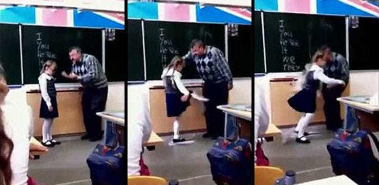 Screenshot van de video waarin is te zien dat een Russisch meisje haar leraar in zijn kruis schopt.