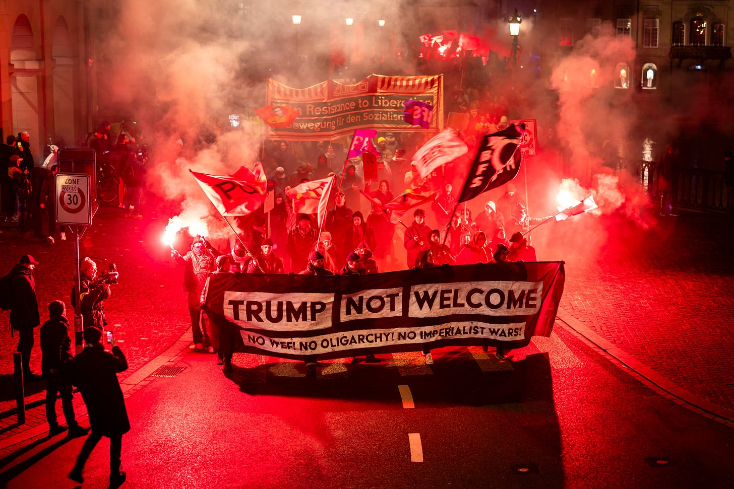 Protesters in Switzerland demonstrate against oligarchs, at a rally against the World Economic Forum Protesters in Switzerland demonstrate against oligarchs, at a rally against the World Economic Forum