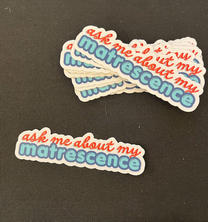 Stickers for the mother of it all podcast. One says ask me about my matrescence