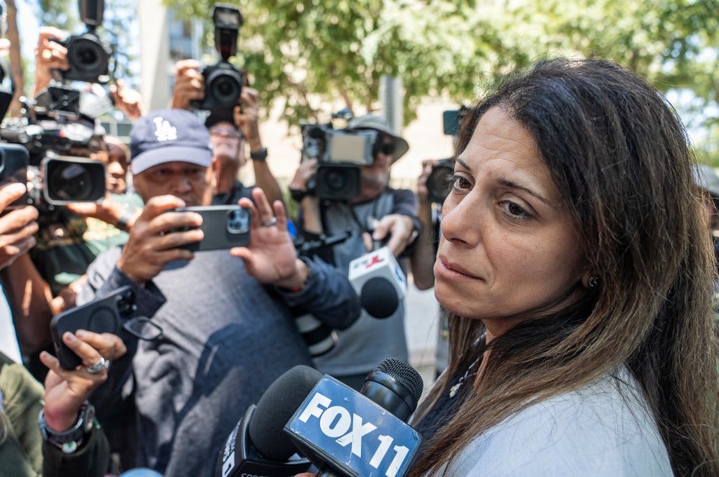 Nancy Iskander speaks outside Van Nuys Courthouse 