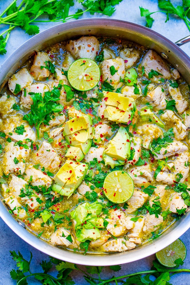 15-Minute Salsa Verde Chicken with Avocado topped with cilantro and lime slices. 