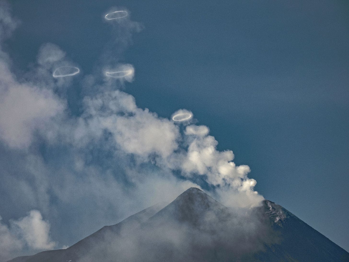 Rings of vapour out of the Etna crater in Sicily.