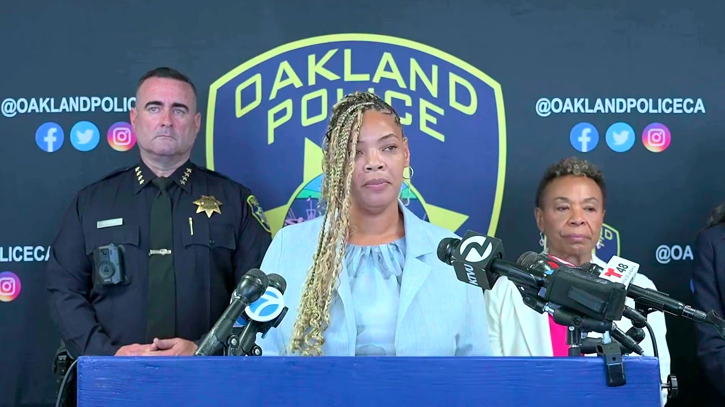 Assistant city administrator Michelle Phillips speaks at a press conference with then-interim police chief James Beere and mayor Barbara Lee on May 18, 2026. (Image source: YouTube / @oaklandpoliceca) Assistant city administrator Michelle Phillips speaks at a press conference with then-interim police chief James Beere and mayor Barbara Lee on May 18, 2026. (Image source: YouTube / @oaklandpoliceca)