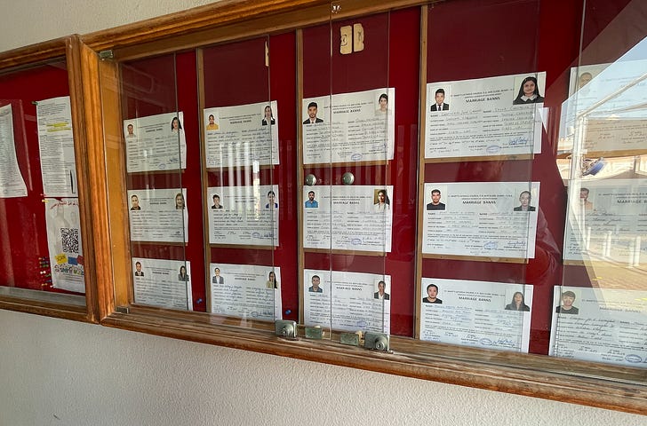 Marriage banns are displayed prominently in cases outside the parish church at St. Mary's Catholic Church, Dubai. Credit: JD Flynn/Pillar Media.