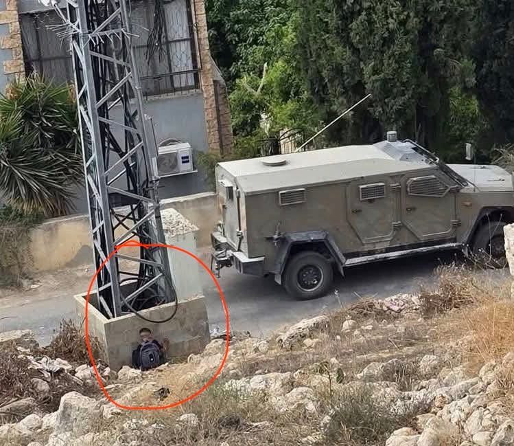 📸 A Heartbreaking Photo of a Palestinian Child Hiding from Israeli Soldiers in the West Bank Reminds Me of Every Holocaust Movie I’ve Seen My Entire Life