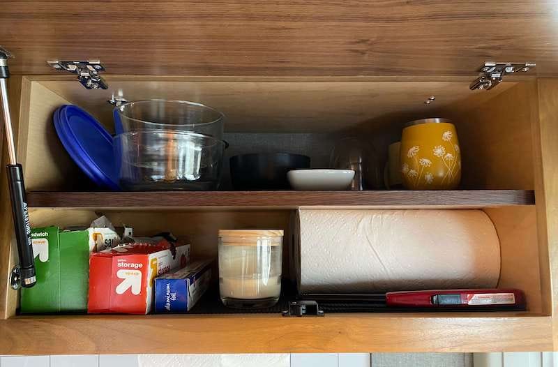Our above counter dish cabinet in our converted camper van