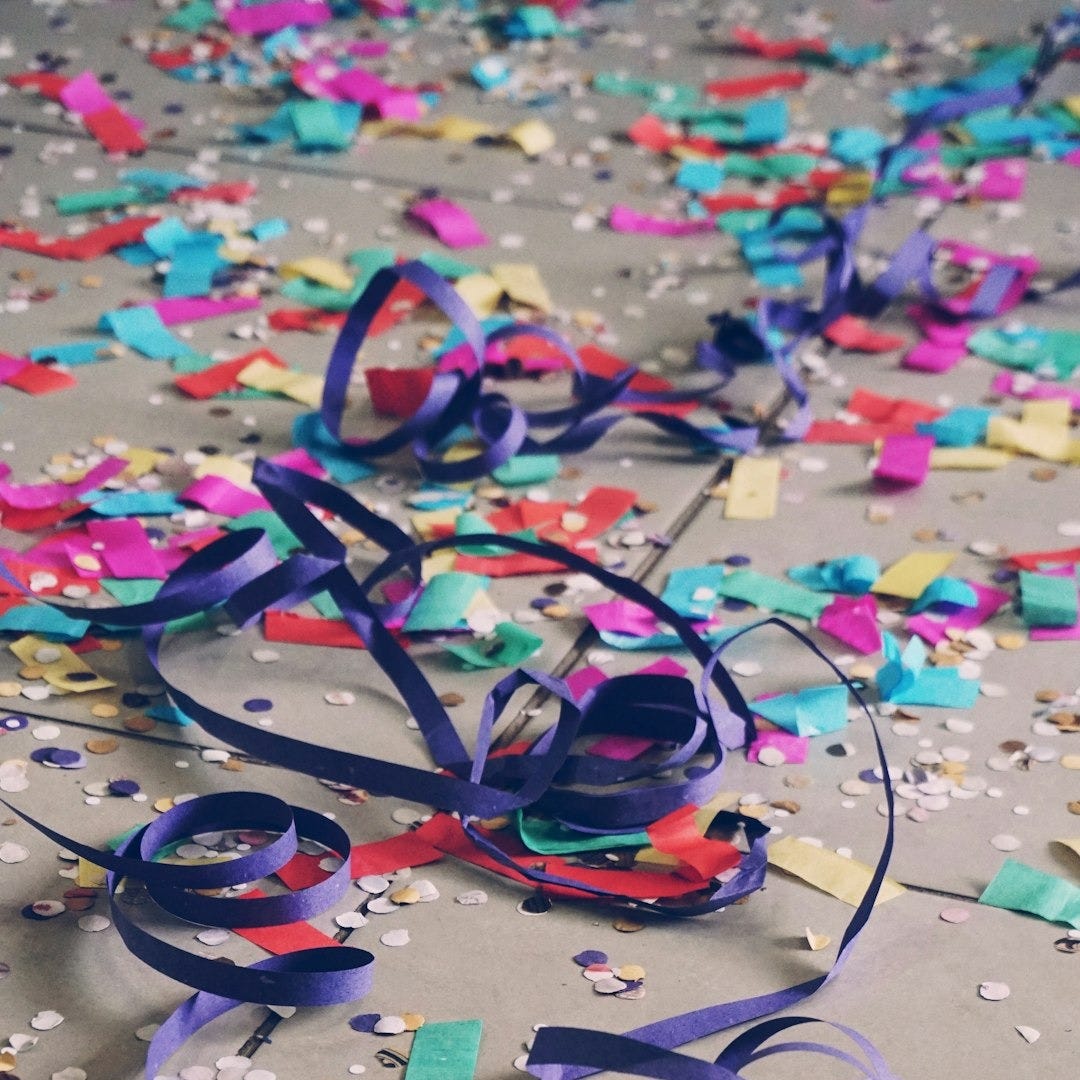 ribbons and confetti on floor\