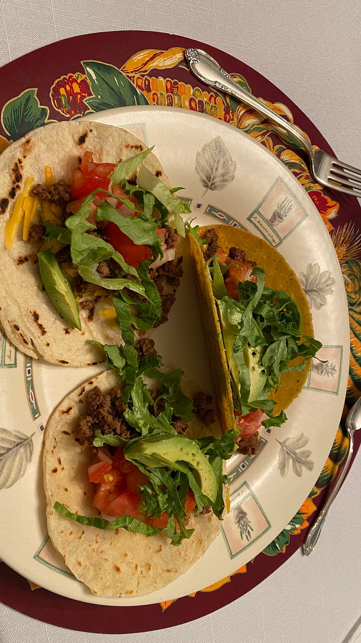 Warm your soft tacos, cook your beef and hard tacos then put it all together.